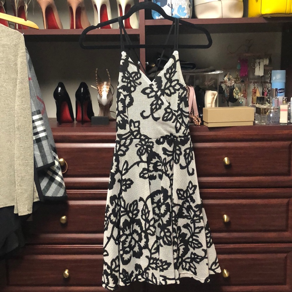 Black and white embroidered dress.